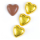 Goldenes Milchschokoladenherz mit Nougatf&uuml;llung