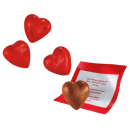 Herzen aus Milchschokolade mit Liebesgruß